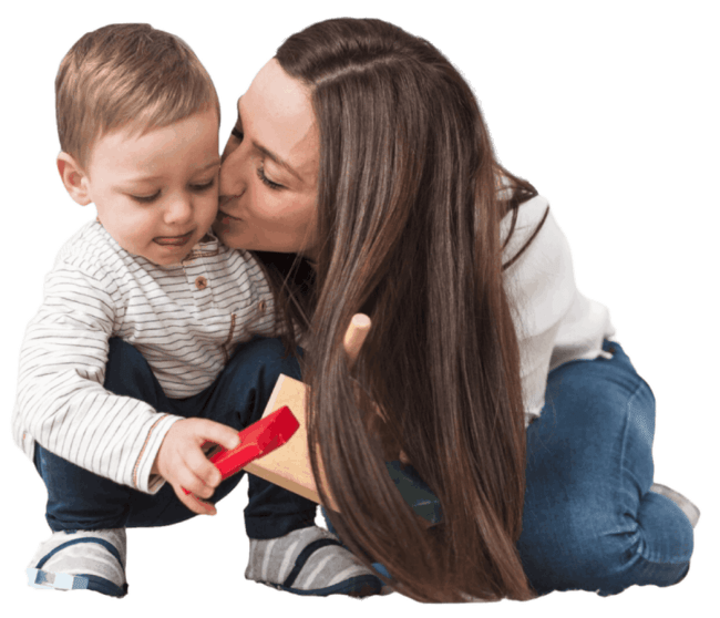 Parent kissing child at Childrens World Childcare Center Canton, Michigan