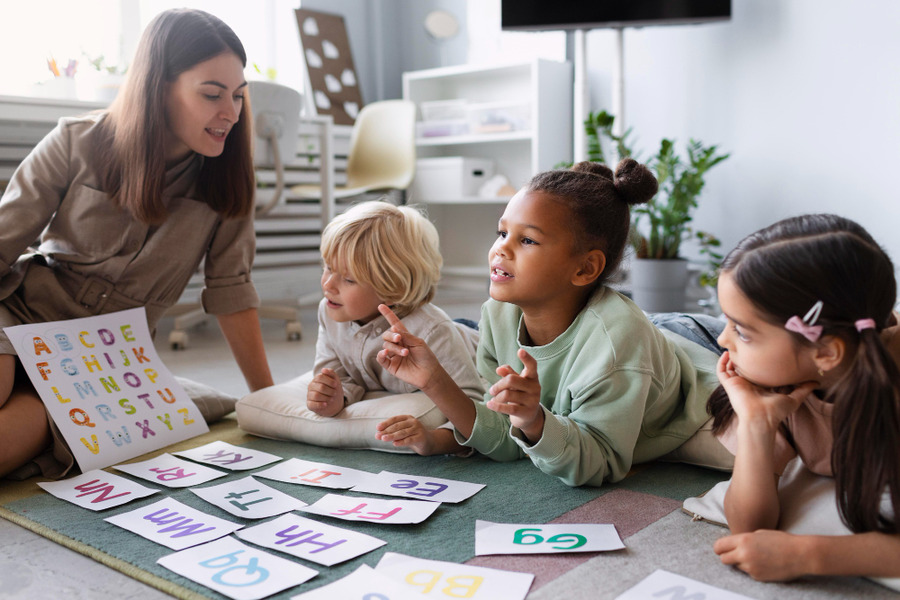 Students learning letters Childrens World Daycare Canton, Michigan